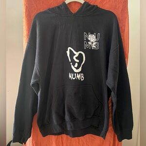 Large black hoodie with numb graphic.